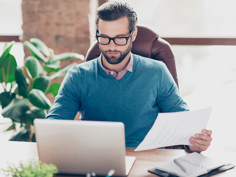 Person at desk on computer